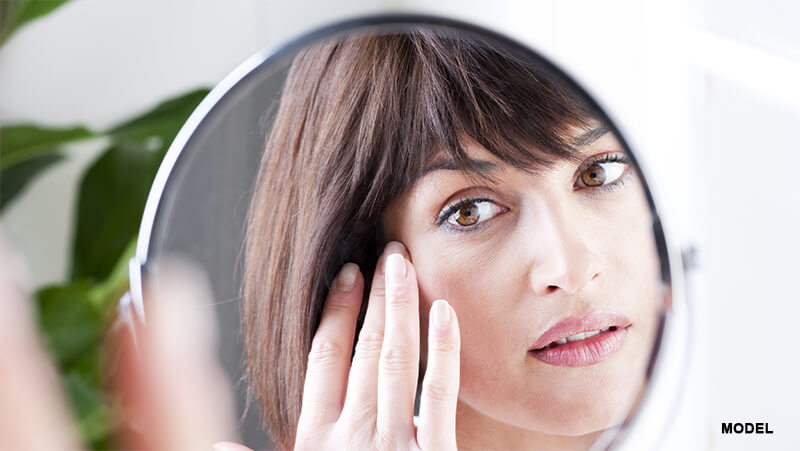 mirror woman dark spots