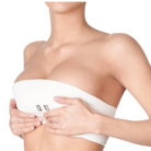 woman post breast augmentation surgery in compression